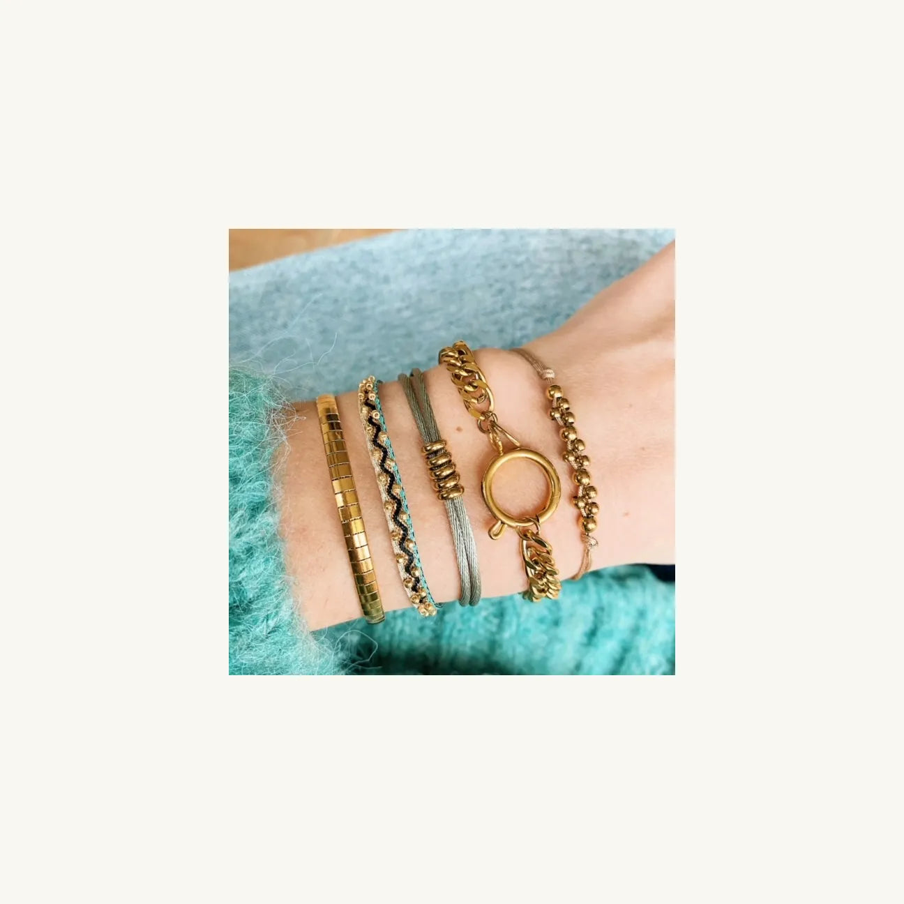 Stalen platte armband gestreept - goud