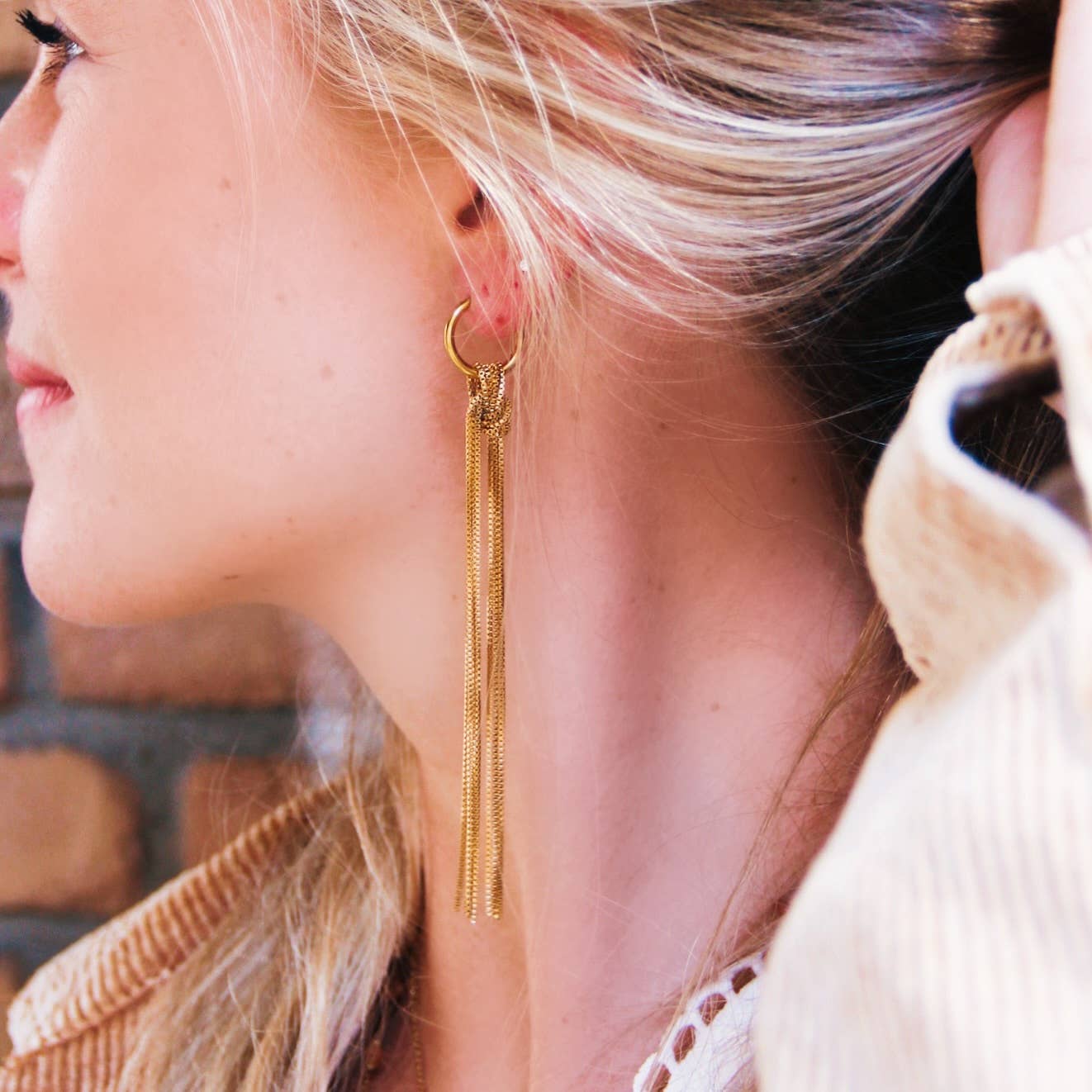 Oorbellen in met lange kwast - goud
