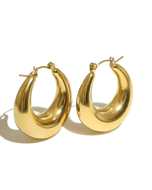 dikke gouden hoepel oorbellen