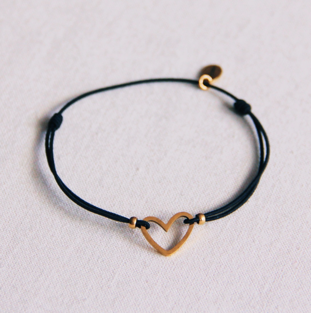 Elastische armband met open hart - zwart