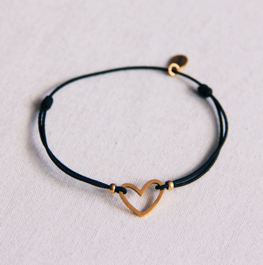 Elastische armband met open hart - zwart