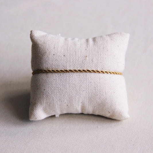 Stalen gedraaide armband goud