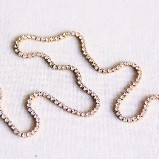 Halsketting met fijne strass in edelstaal - wit/goud