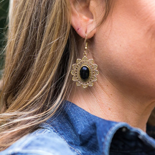 Oorbellen gouden zon zwart