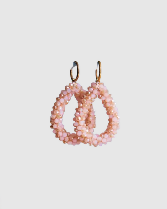 Oorbellen in edelstaal met facetdruppel perzikroze